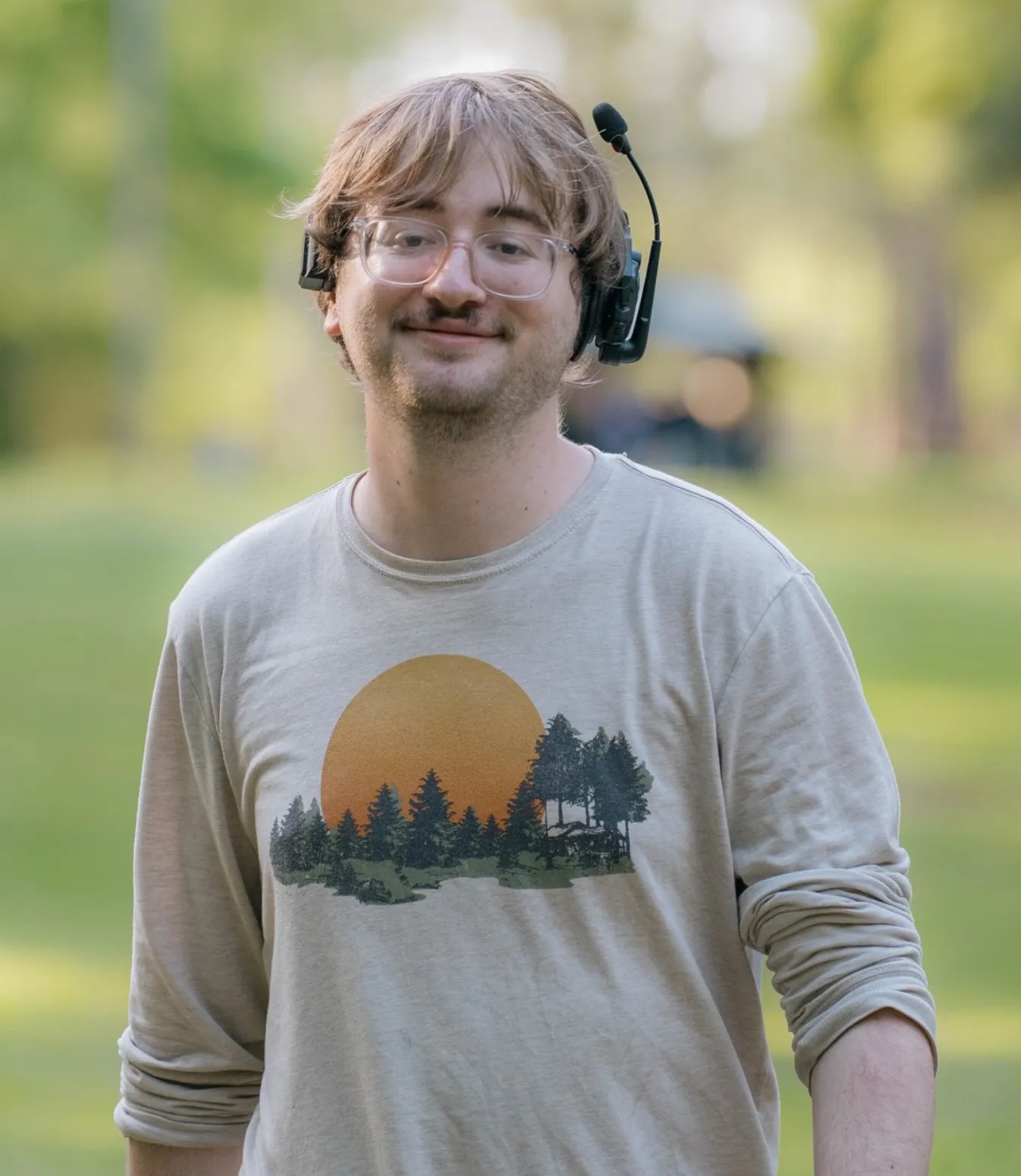 Charles Altig wearing a production headset outdoors